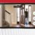 samsung phone displaying teenage boy entering door using total connect camera app