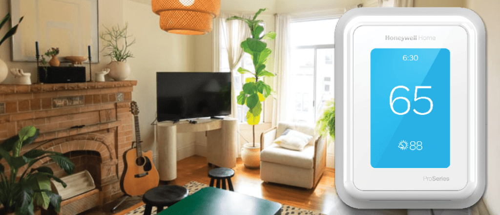 ProSeries thermostat from Honeywell Home reads sixty-five degrees, shown in cozy living room area. 