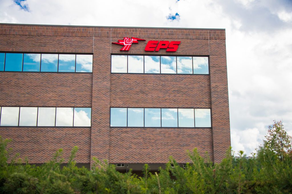 Font of brick, EPS Security Grand Rapids building with red EPS logo. 